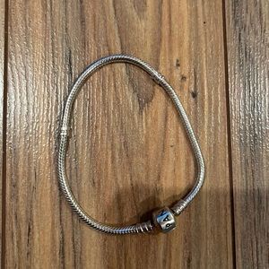 Pandora bracelet with Disney and love beads